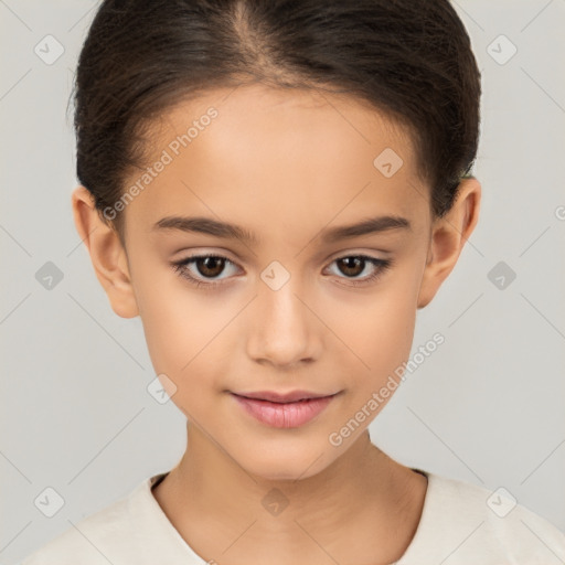 Joyful white child female with short  brown hair and brown eyes