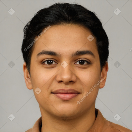 Joyful latino young-adult female with short  black hair and brown eyes