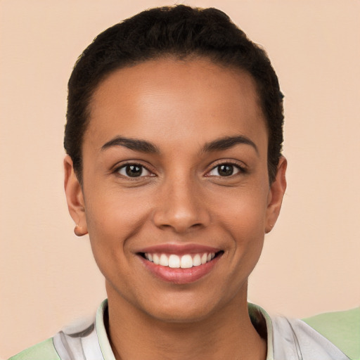 Joyful white young-adult female with short  black hair and brown eyes