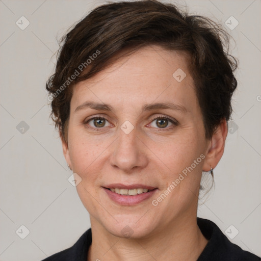 Joyful white adult female with medium  brown hair and grey eyes