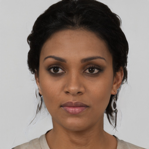 Neutral black young-adult female with short  black hair and brown eyes