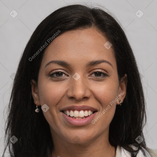 Joyful latino young-adult female with long  brown hair and brown eyes