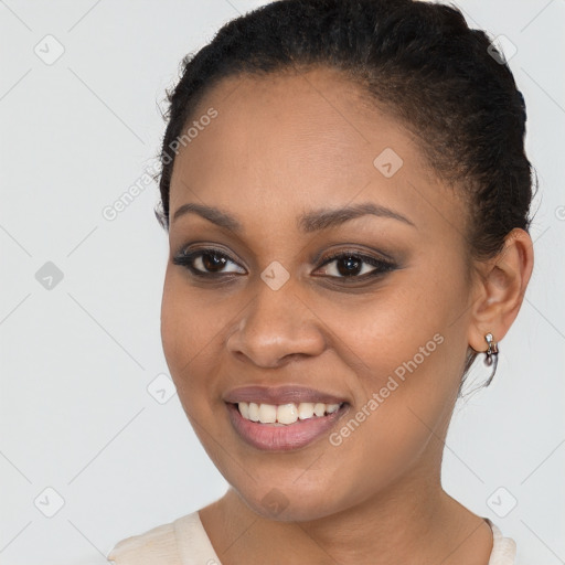 Joyful black young-adult female with short  brown hair and brown eyes