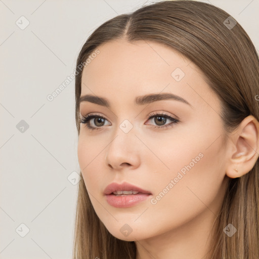 Neutral white young-adult female with long  brown hair and brown eyes