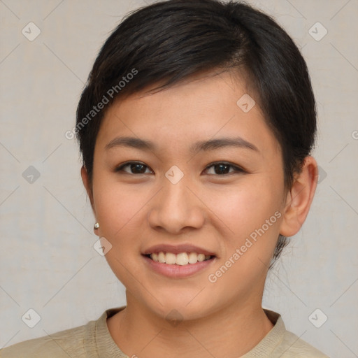 Joyful latino young-adult female with short  brown hair and brown eyes