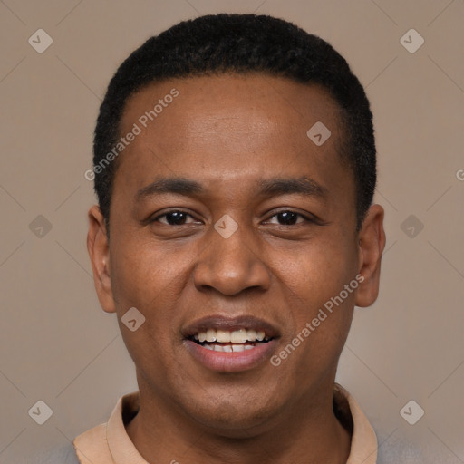 Joyful black young-adult male with short  black hair and brown eyes