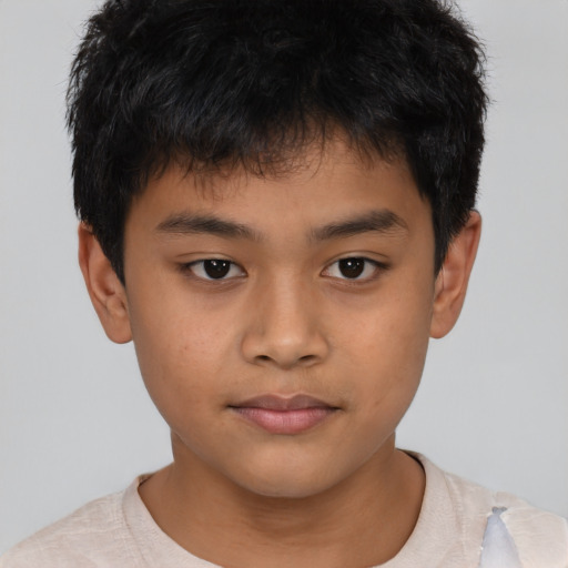 Neutral asian child male with short  brown hair and brown eyes