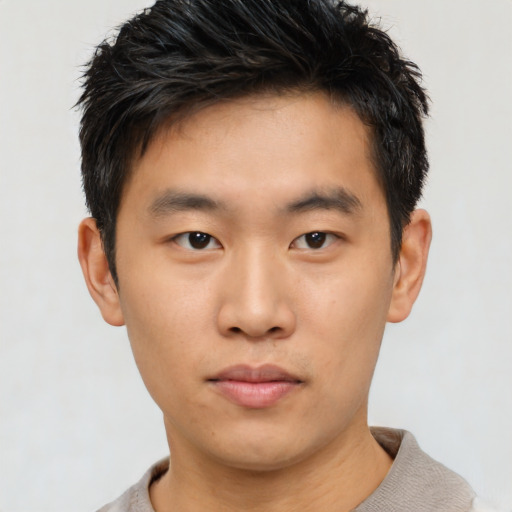 Neutral asian young-adult male with short  black hair and brown eyes