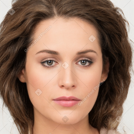 Joyful white young-adult female with long  brown hair and green eyes