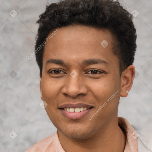 Joyful latino young-adult male with short  brown hair and brown eyes