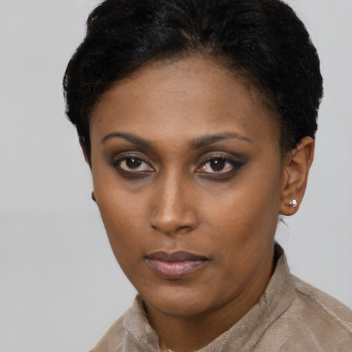 Neutral black young-adult female with short  brown hair and brown eyes