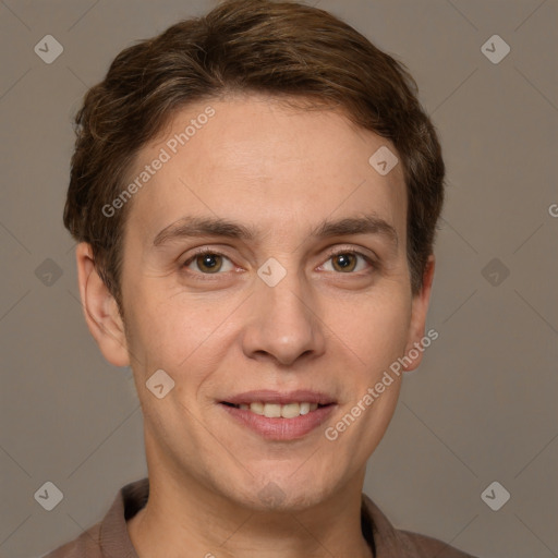 Joyful white adult male with short  brown hair and grey eyes