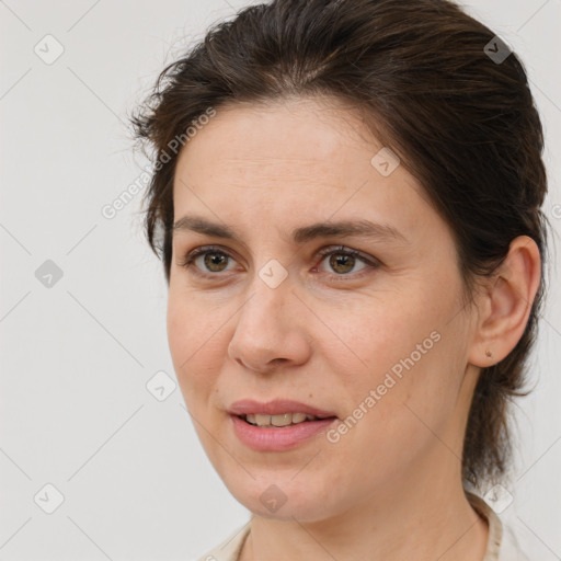 Joyful white adult female with medium  brown hair and brown eyes