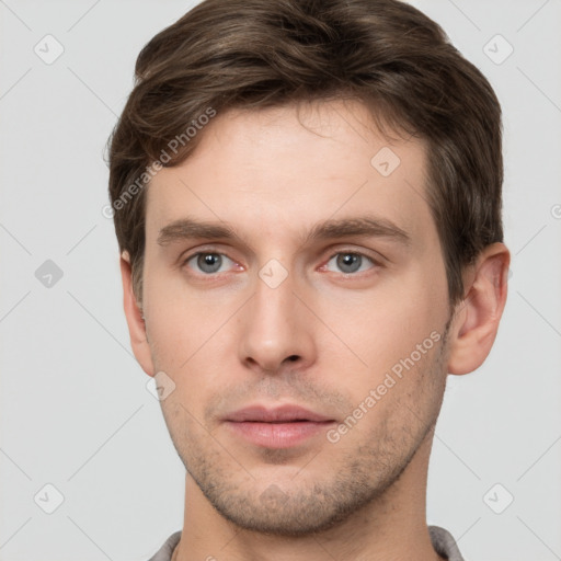 Neutral white young-adult male with short  brown hair and grey eyes