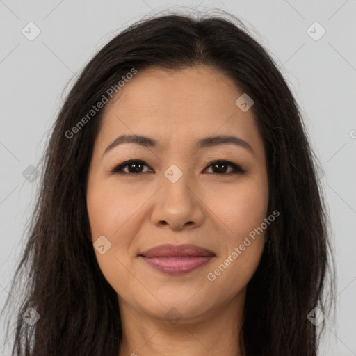 Joyful asian young-adult female with long  brown hair and brown eyes