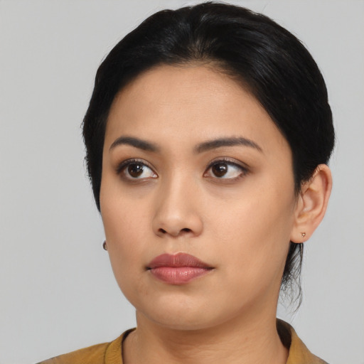 Neutral asian young-adult female with medium  black hair and brown eyes