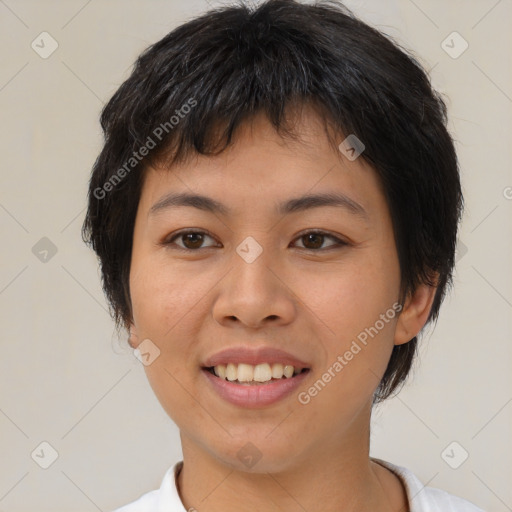 Joyful asian young-adult female with short  brown hair and brown eyes