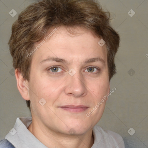 Joyful white adult female with short  brown hair and grey eyes