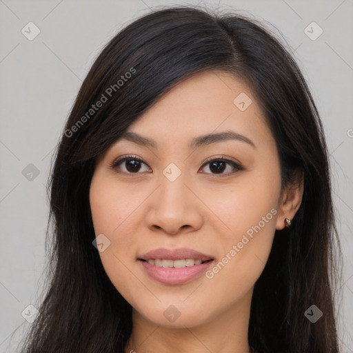 Joyful asian young-adult female with long  brown hair and brown eyes