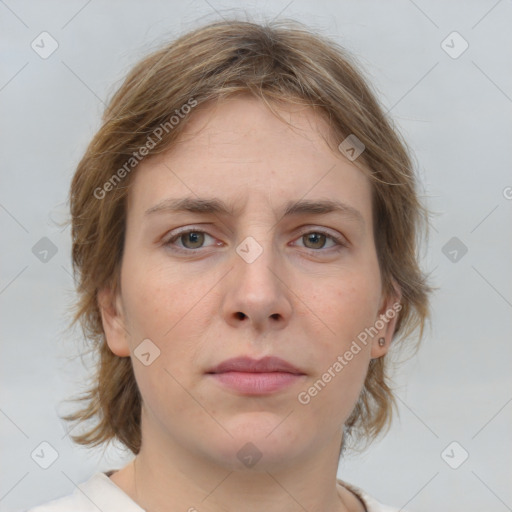 Neutral white young-adult female with medium  brown hair and grey eyes