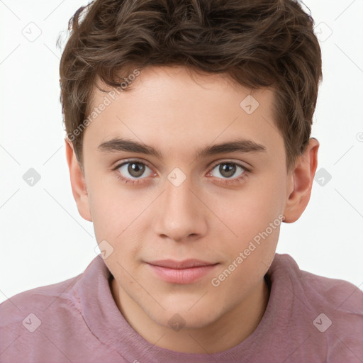 Joyful white child male with short  brown hair and brown eyes