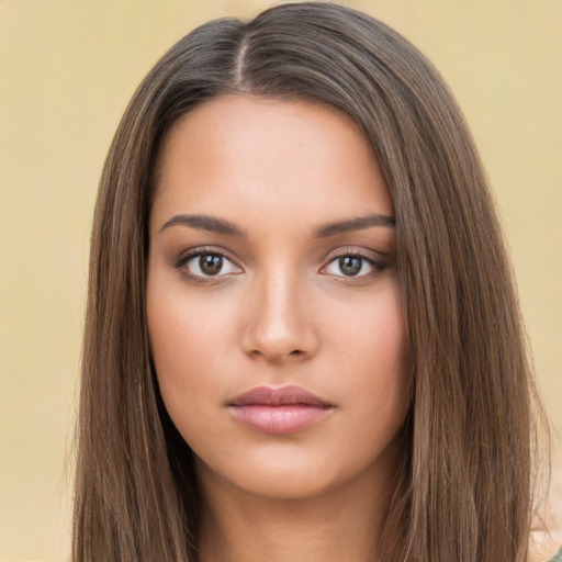 Neutral white young-adult female with long  brown hair and brown eyes