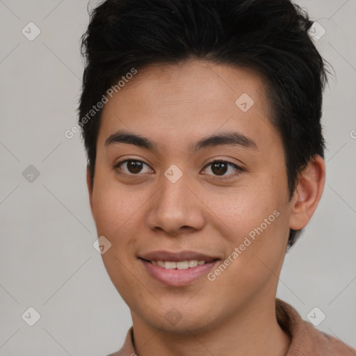 Joyful asian young-adult male with short  brown hair and brown eyes