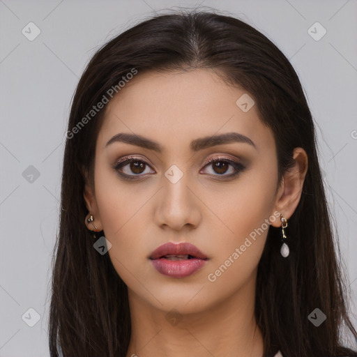 Neutral white young-adult female with long  brown hair and brown eyes