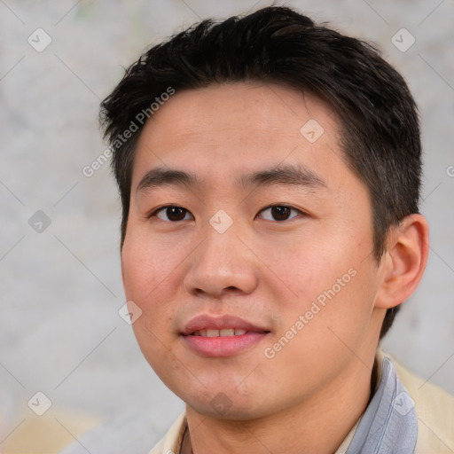 Joyful asian young-adult male with short  black hair and brown eyes