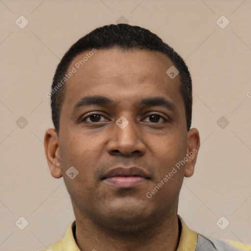 Neutral latino young-adult male with short  black hair and brown eyes