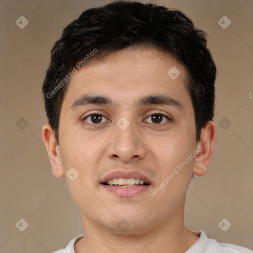 Joyful white young-adult male with short  black hair and brown eyes