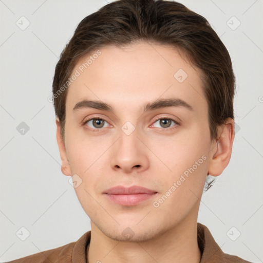 Neutral white young-adult male with short  brown hair and brown eyes