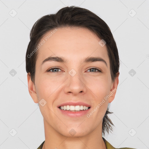 Joyful white young-adult female with short  brown hair and brown eyes