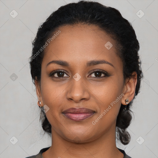 Joyful black young-adult female with medium  black hair and brown eyes