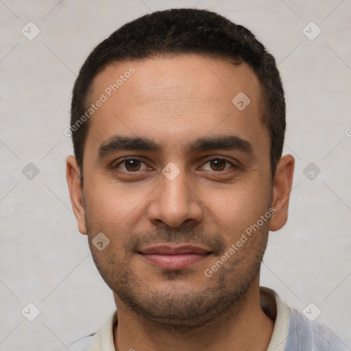 Joyful white young-adult male with short  black hair and brown eyes