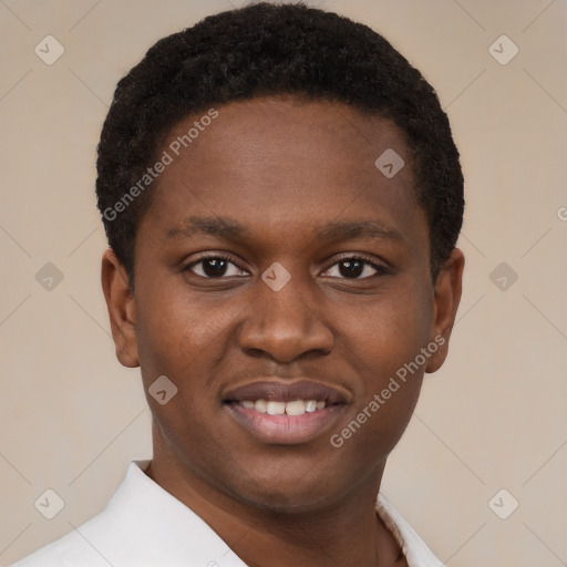 Joyful black young-adult male with short  brown hair and brown eyes