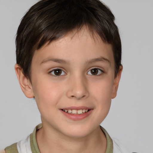 Joyful white child female with short  brown hair and brown eyes