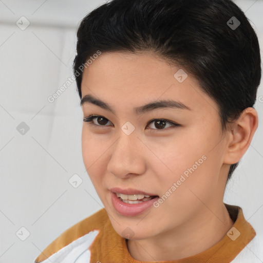 Joyful asian young-adult female with short  brown hair and brown eyes