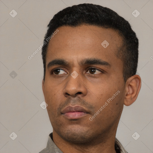 Neutral latino young-adult male with short  black hair and brown eyes