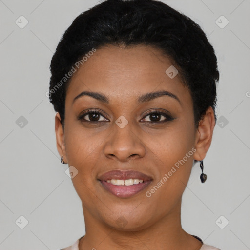 Joyful black young-adult female with short  black hair and brown eyes