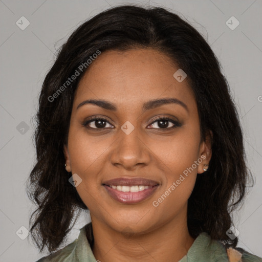 Joyful black young-adult female with medium  brown hair and brown eyes