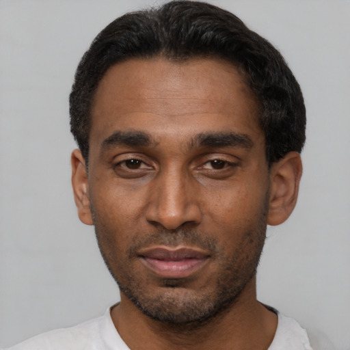 Neutral latino young-adult male with short  black hair and brown eyes