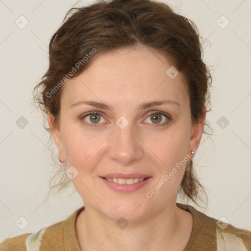 Joyful white young-adult female with medium  brown hair and green eyes