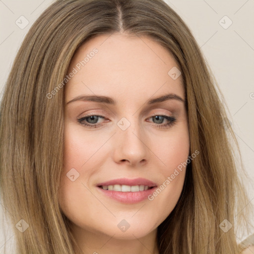 Joyful white young-adult female with long  brown hair and green eyes