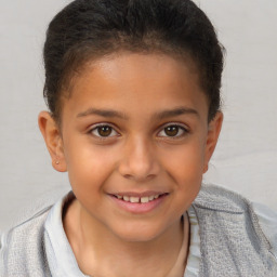 Joyful white child female with short  brown hair and brown eyes