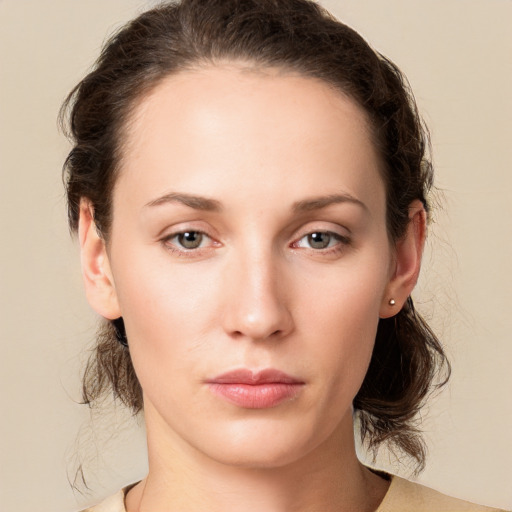 Neutral white young-adult female with medium  brown hair and grey eyes