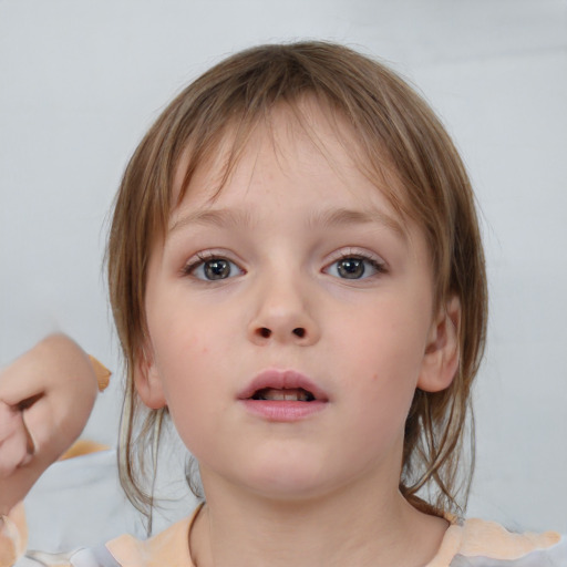 Neutral white child female with medium  brown hair and brown eyes