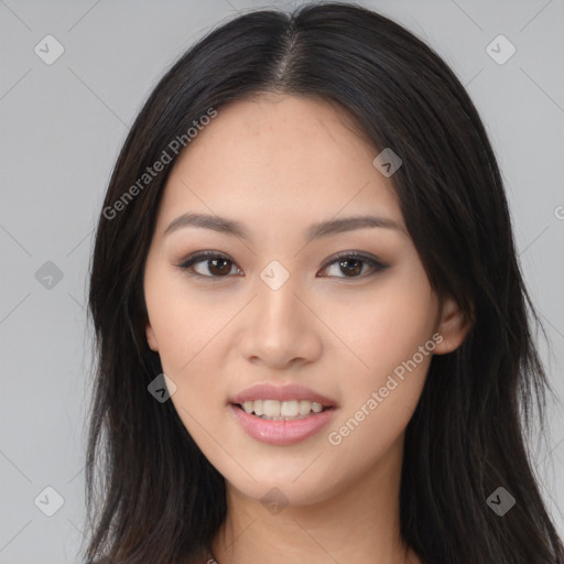 Joyful asian young-adult female with long  black hair and brown eyes