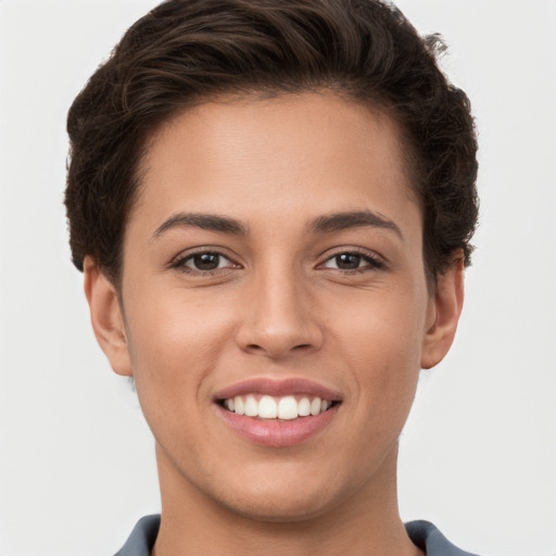 Joyful white young-adult female with short  brown hair and brown eyes