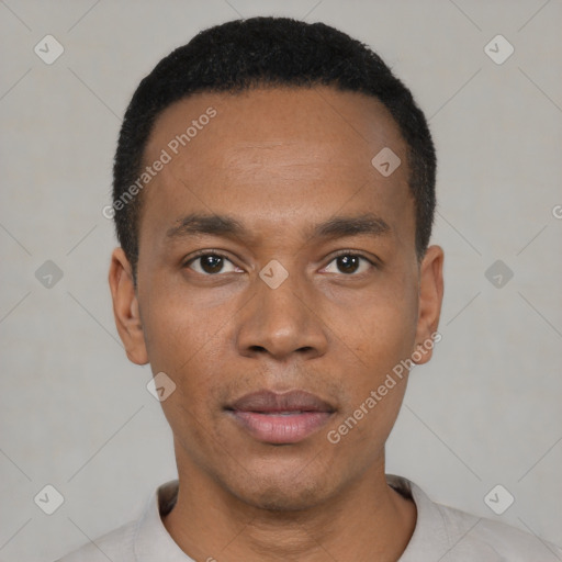 Neutral latino young-adult male with short  black hair and brown eyes